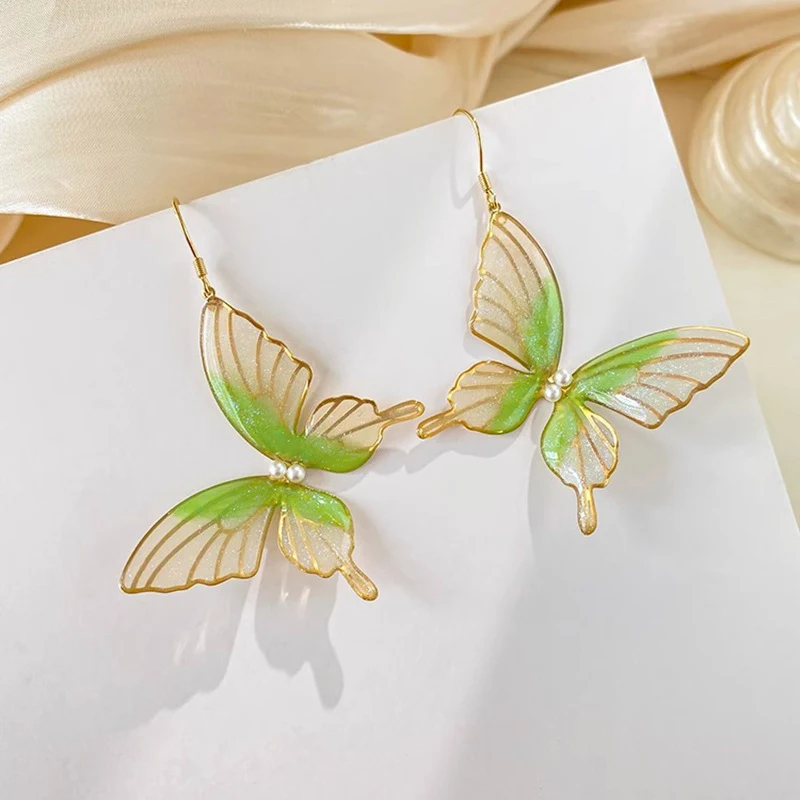 Title 2, Boucles doreilles à grand nœud papillon style ...