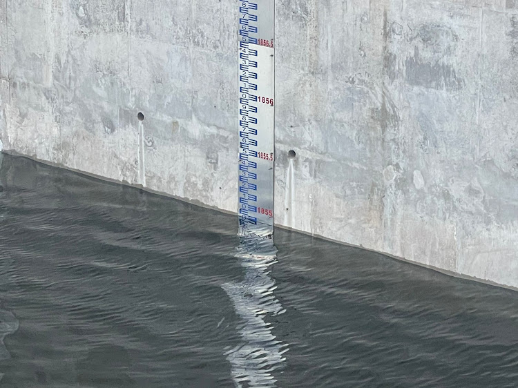 Photo showing water levels at nearly 1,855 feet.