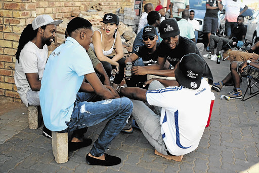 BLACKGROUND FIGURE: Anita Ronge, aka The DuchAz and the Kasi Mlungu, chills with friends at Phosa's Tavern in Tembisa