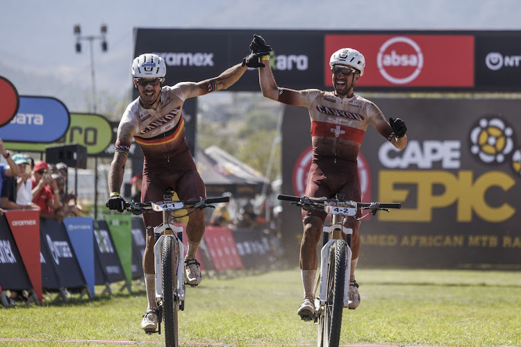 Andreas Seewald and Marc Stuzmann of Canyon Sidi win stage three of the Absa Cape Epic from Saronsberg Wine Estate to CPUT, Wellington on March 20, 2024