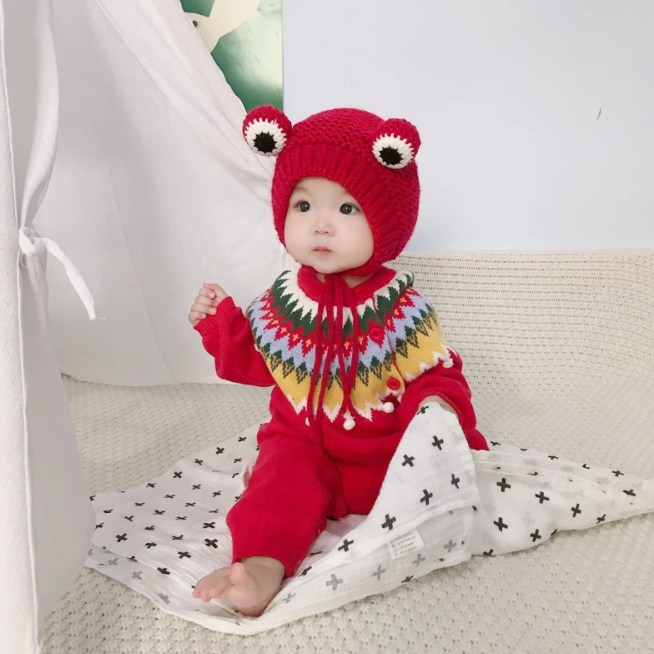 Etnische stijl wollen jumpsuit voor baby's, herfst en winter. Houd je baby warm en modieus tijdens de koudere maanden.