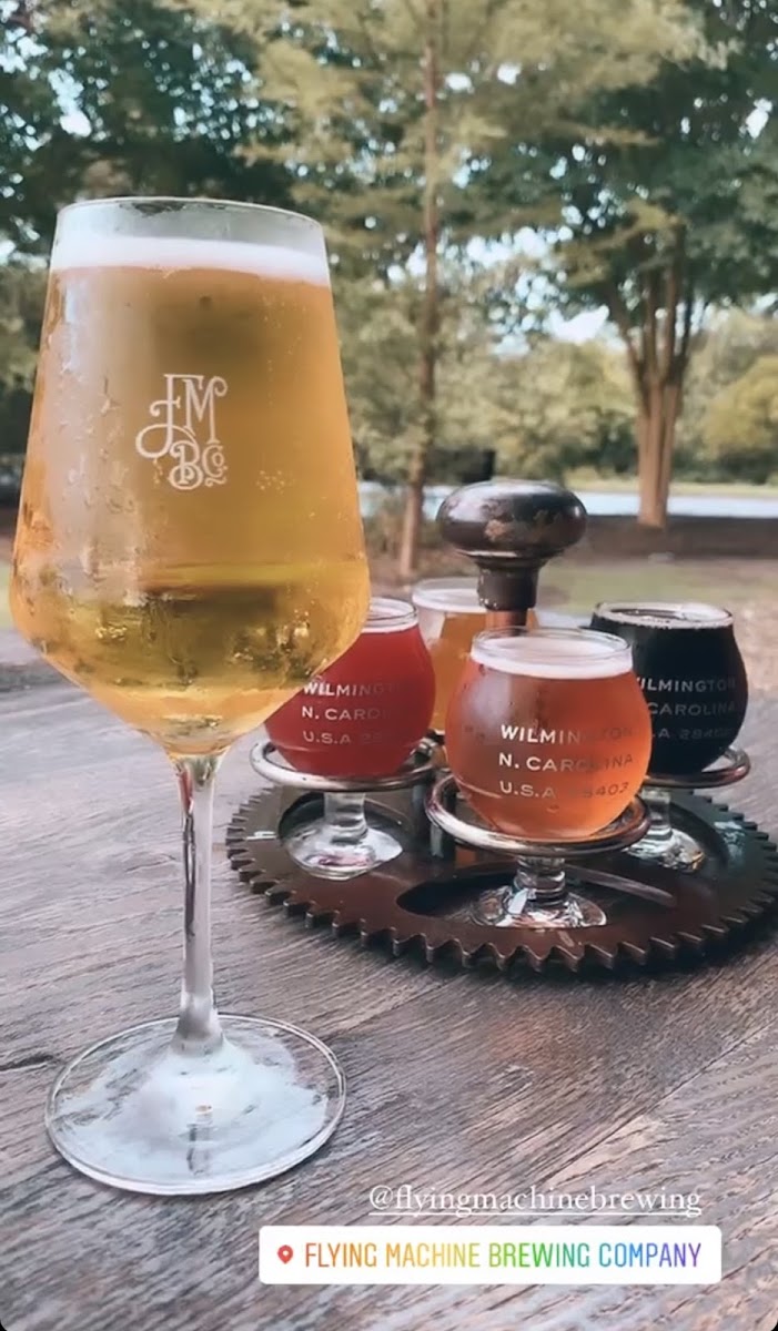 Cider in front for me, beer flight in the back for my boyfriend