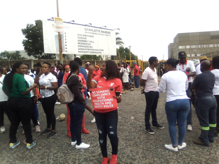 Nehawu affiliated workers protesting outside the Charlotte Maxeke Hospital in Parktown, Johannesburg.