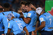 Bulls players celebrate the try of Elrigh Louw during their Heineken Champions Cup match against Exeter Chiefs at Loftus Versfeld in Pretoria on January 14 2023.