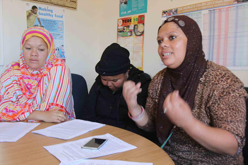 SPEAKING OUT: Three Grahamstown women who are married to foreigners, from left, Jamila Raaes, Amnah Khan and Barbara-Ann Ali, say more could have been done to prevent widespread xenophobic looting last week Picture: DAVID MACGREGROR