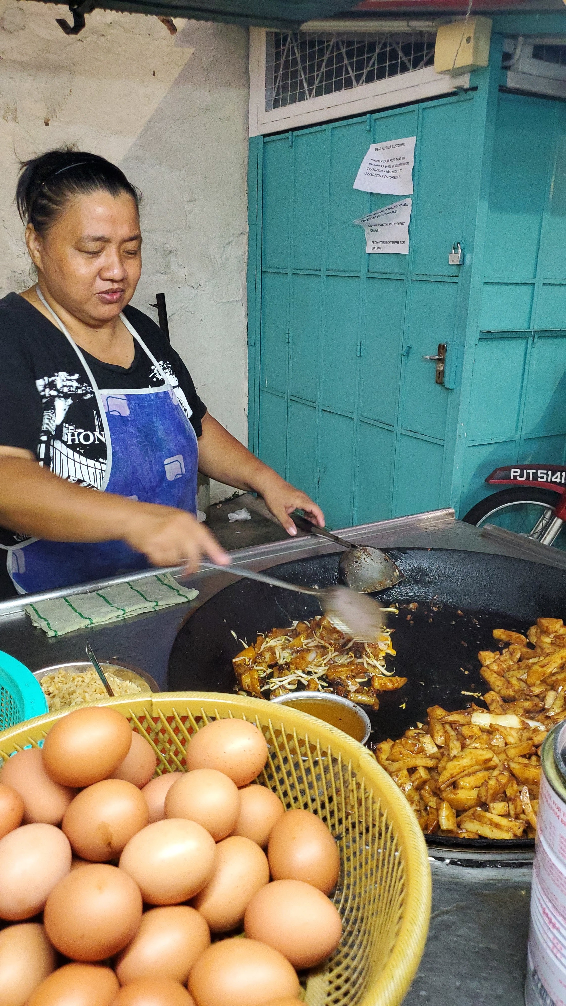 Food Highlights of Penang: Char koay kak, a dish of radish cake stir-fried in a thick black soy sauce with preserved radish, bean sprouts, and egg