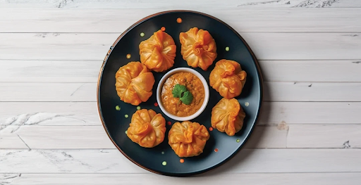 Veg Stir Fried Momos [6 Pieces]