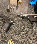 Pistols and ammunition seized from three Durban men on Friday