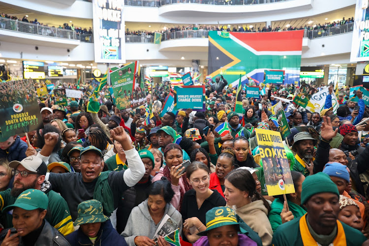 South Africans came in numbers at the OR Tambo international airport to celebrate the Springboks' rugby world cup victory.