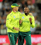 The Proteas' Andile Phehlukwayo  celebrates with teammate Rassie van der Dussen.  