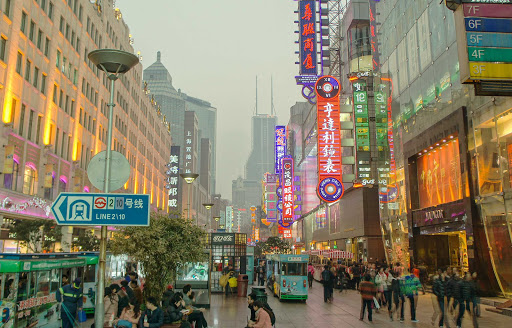 Pedestrians shopping along East Nanjing in the Huangpu District of Shanghai, China. 