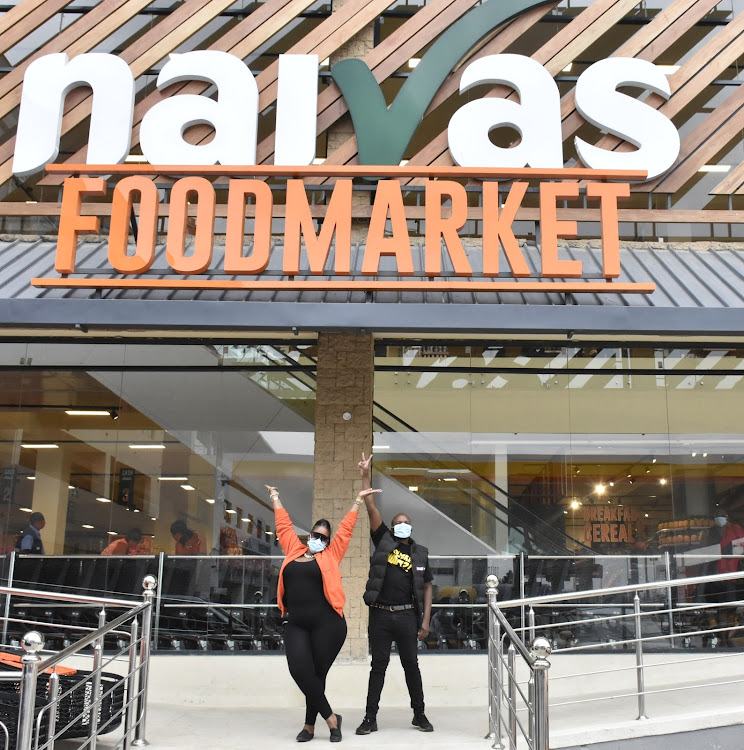 Kiss FM presenters Kamene and Jalang'o at Naivas Airport View Supermarket