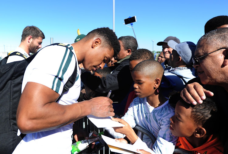 Damian Willemse of South Africa signs autographs during the 2018 Rugby Championship South Africa training and fan engagement at Belhar Rugby Club in Cape Town on 9 August 2018.