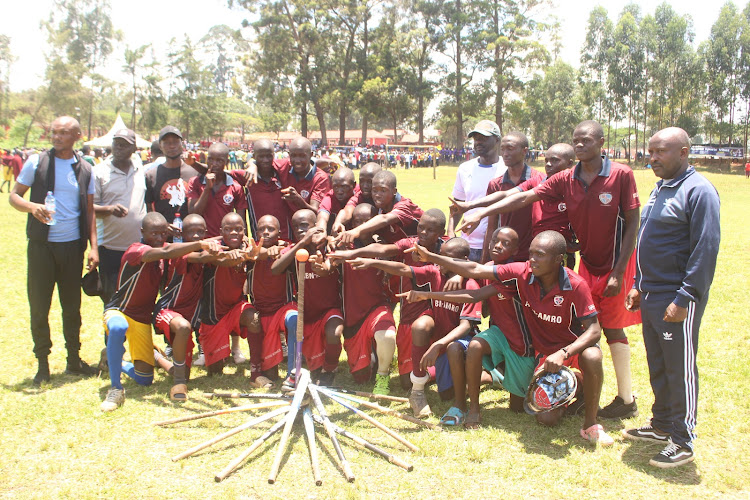 Nduru Boys pose for a photo after retaining the Kisii County hockey title for the third consecutive year