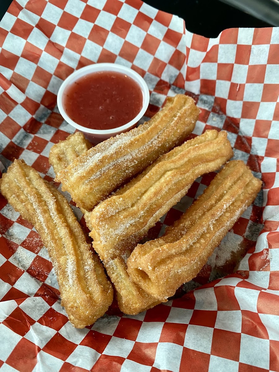 Churros wirh strawberry sauce