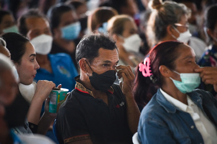 Families of victims mourn outside a child care centre on October 7 2022 in Uthai Sawan subdistrict, Nong Bua Lamphu, Thailand. Picture: GETTY IMAGES/Sirachai Arunrugstichai