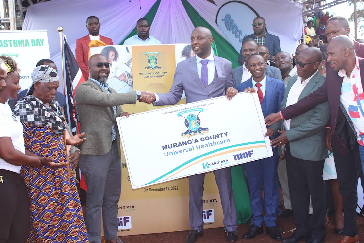 NHIF CEO Peter Kamunyo and Murang'a Governor Irungu Kang'ata commission Kang'ata Care NHIF programme at Gakoigo grounds on December 11, 2022.