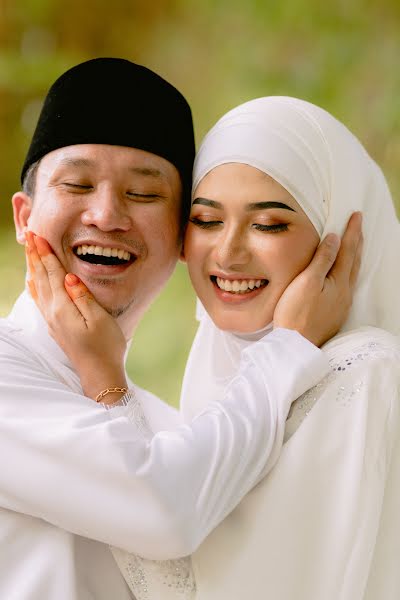 結婚式の写真家Zulfadhli Zainudin (symbiotic)。2月6日の写真