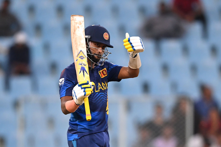 Sri Lanka's Sadeera Samarawickrama celebrates his half century during the ICC Men's Cricket World Cup India 2023 match against Netherlands at BRSABVE Cricket Stadium on October 21, 2023 in Lucknow, India.