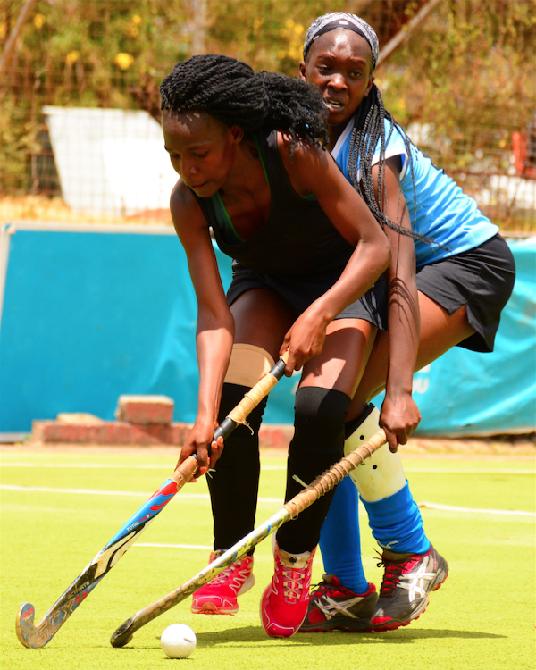 Vivian Ogweno of Lakers (L) shields the ball from Nelly Ogutu of Kenyatta University in a past match