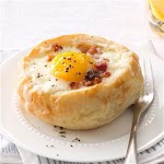 Breakfast Bread Bowls Recipe was pinched from <a href="http://www.tasteofhome.com/recipes/breakfast-bread-bowls" target="_blank">www.tasteofhome.com.</a>