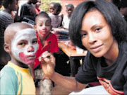 VICTORY: Sowetan's campaigning front page of December 5 2008 - now Sibusiso Lamula and his mother Phumzile are all smiles after yesterday's High court decision. 03/03/09. Pic. Vathiswa Ruselo. © Sowetan.