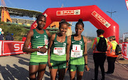 Ethiopian runner Tadu Nare (centre) won the Spar 10km race in Mbomebla. She was followed in second place by Helalia Johannes of Namibia (left) and Ethiopian Selam Gebre in third.