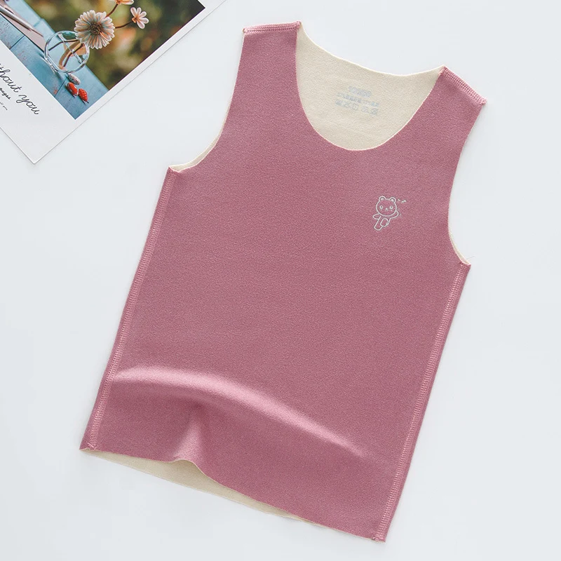 Sous-veste sans manches brossée double face sans couture pour enfants – confort et chaleur, parfaite pour superposer les vêtements.