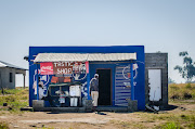 A police captain has been arrested for allegedly extorting the owner of a spaza shop. Stock photo.