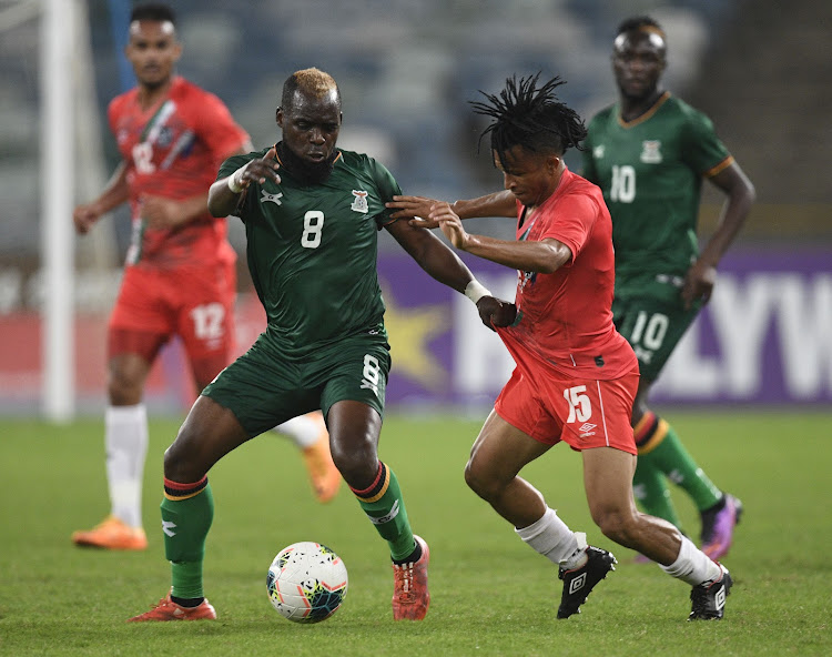 Saddam Phiri of Zambia challenges Marcela Papama of Namibia in the 2022 Cosafa Cup final at Moses Mabhida Stadium in Durban on July 17.