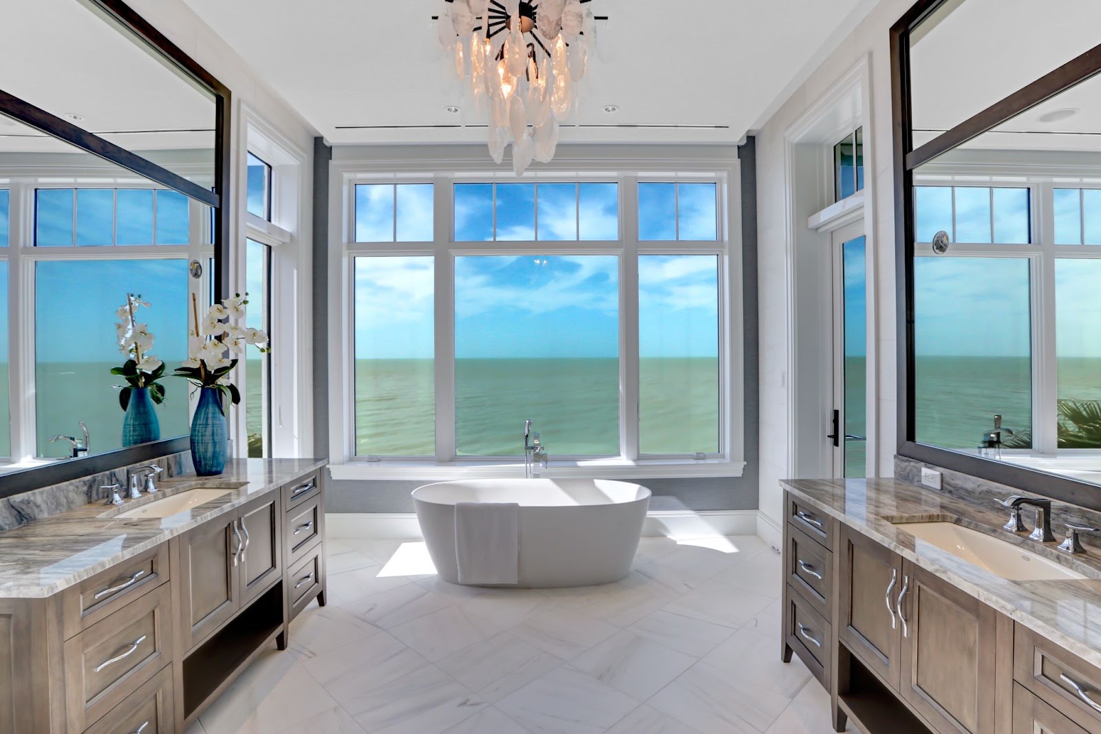 A coastal decor bathroom on the water.