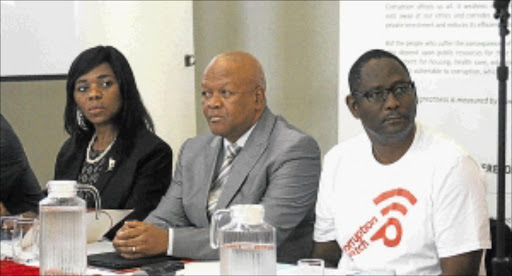 CORRUPTION BUSTERS: Public protector Thuli Madonsela, Minister of Justice Jeff Radebe and Cosatu generalthe secretary Zwelinzima Vavi yesterday at the launch of the labour federation's anti-corruption watchdog. The body was launched at the Constitution Hill in Johannesburg. PHOTO: SIBUSISO MSIBI