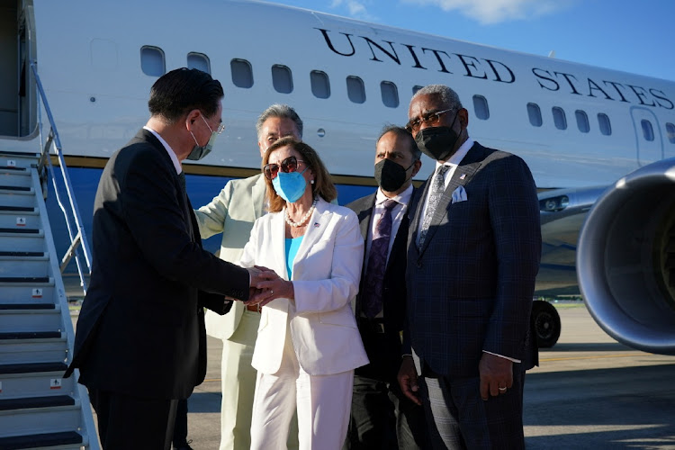 US House speaker Nancy Pelosi talks with Taiwan foreign minister Joseph Wu before boarding a jet at Taipei Songshan Airport in Taipei, Taiwan, on August 3 2022. Picture: TAIWAN MINISTRY OF FOREIGN AFFAIRS/REUTERS