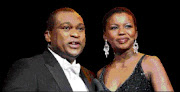 SHOULDER TO SHOULDER: Prominent sports presenters Robert Marawa and Carol Manana. Pic. Sydney Seshibedi. 24/06/2009. © Sunday Times.