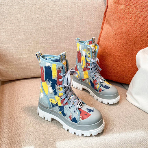 Title 2, Canvas graffiti boots for bold style. High-top ...