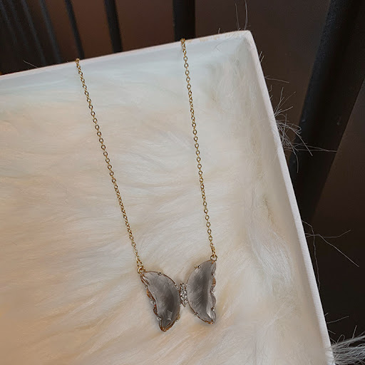 Title 9, Butterfly crystal necklace