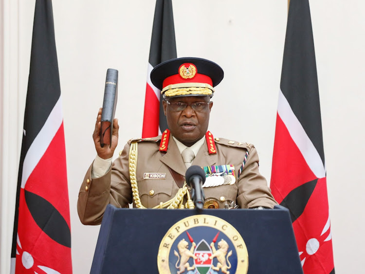 General Robert Kariuki Kibochi takes the oath of office as the new Chief of Kenya Defence Forces during the swearing in ceremony witnessed by President Uhuru Kenyatta at State House, Nairobi.