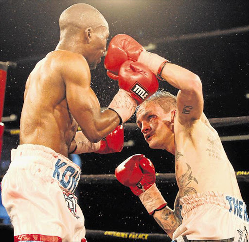 Hekkie Budler and Simphiwe Khonco during the WBA and IBO minimumweight title bout between Hekkie Budler and Simphiwe Khonco at Emperors Palace in Kempton Park. Picture: Gallo Images