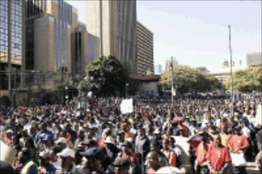 MASS ACTION: Municipal workers at a meeting before their intended strike in Johannesburg on Thursday. 23/05/09. Pic. Antonio Muchave. © Sowetan.