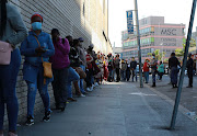 FILE IMAGE: Long queues at the UIF offices as employees line up to get their UIF Ters monies. 