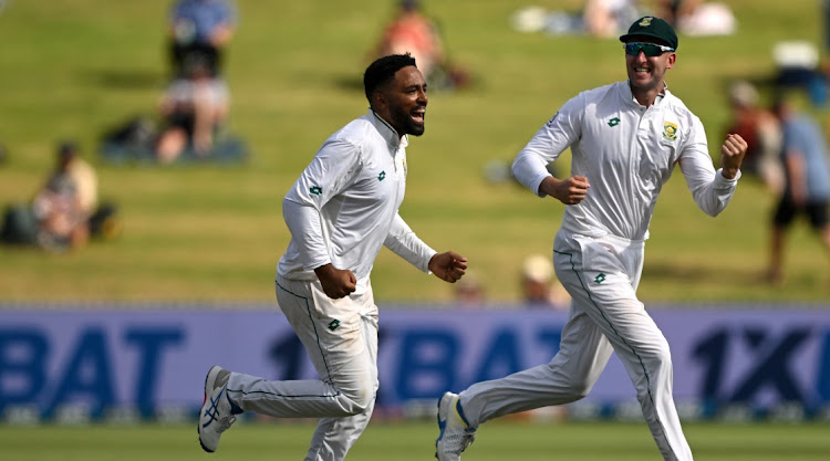 Dane Piedt and Proteas skipper Neil Brand celebrate the wicket of Will Young in Hamilton on Wednesday. Picture: HANNAH PETERS/GETTY IMAGES