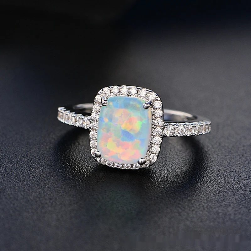 Europese en Amerikaanse veelkleurige roze diamant opaal ring met ingelegde zirkonia, eenvoudig en modieus, perfect voor dames.