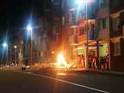 University of KwaZulu-Natal students threw their metal bed frames on to the street and set them alight on Sunday night. 