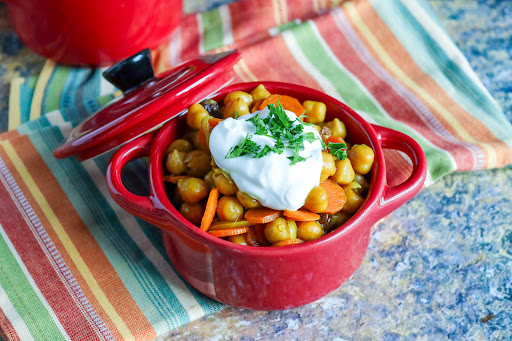 Chickpea Tagine With Cinnamon, Cumin, and Carrots in a serving bowl.