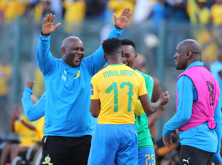 Mamelodi Sundowns head coach Pitso Mosimane celebrates with his players.