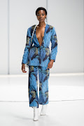 A model walks the Michael Ludwig SA Fashion Week Spring Summer 2024 in a botanical-inspired power suit. 