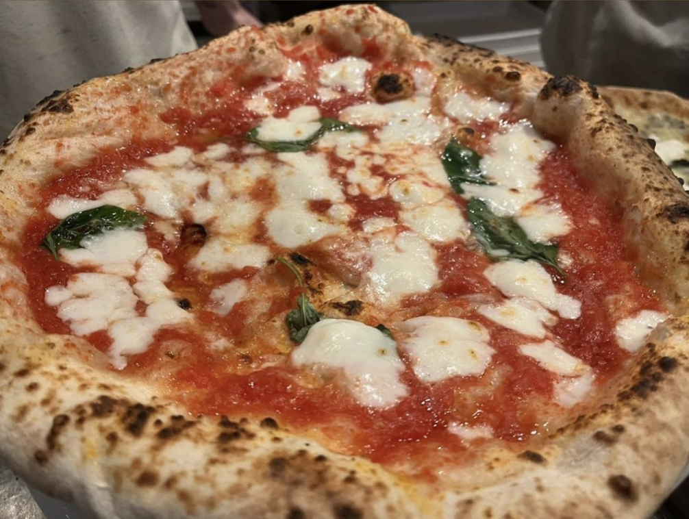 Our Gluten-Free Margherita Pizza celebrates simplicity and taste, featuring San Marzano tomatoes, Agerola mozzarella, aromatic basil, and a dash of extra virgin olive oil.