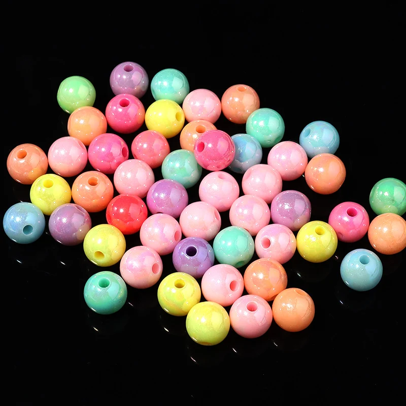 Perles en vrac AB acryliques colorées pour bracelets et colliers, accessoires créatifs et vibrants pour la création de bijoux uniques.