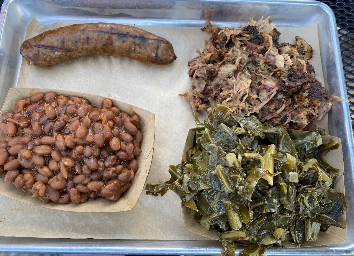 Pork, jalapeño sausage, collard greens, and baked beans.