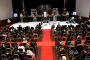 Mourners  at Chef Lentswe's funeral service. 